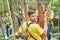 Man and his team together in the high ropes course