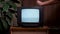 Man hitting old TV screen close up. 80s home interior old television set. Bad television signal noise. No signal tv