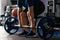 Man hold 20 kg lifting weight in gym