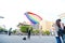 A man hold a big rainbow flag in the Taipei LGBTQIA pride, Taiwan. October 28, 2017.