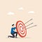 Man hold big target with arrow in bullseye. Purpose in business, success, goal achievement, victory. Marketing strategy