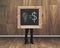 Man hold blackboard with hand-drawn ideas equal money concept