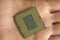 Man hold an hi tech desktop pc cpu part,computer components chip shortage