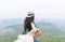 Man Hold Woman Hand, Tourist Couple With Backpack On Mountain Top Back Rear View Enjoy Beautiful Landscape