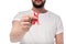 Man holding aids ribbon