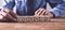 Man holding Change word on wooden cubes