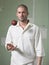 Man Holding Cricket Ball