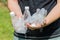 Man holding crushed plastic bottles in his hands, Eco friendly lifestyle, Zero Waste