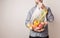 Man holding eco friendly zero waste shopping bag with food