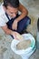 Man holding handful grain