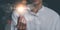man holding a light bulb, lessons and Internet online education and learning concept, professional courses, learning new things, e