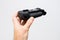 Man holding new camera battery grip