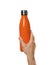 Man holding orange thermos bottle on white background, closeup