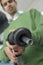 Man Holding Petrol Nozzle