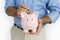 Man Holding Piggy Bank Saving Portrait Concept