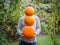 Man holding pumpkins