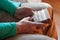 Man holding traditional African musical instrument kalimba in one`s hands. Man playing on the kalimba.