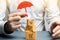 A man holding an umbrella above the boxes. Insurance of purchases and parcels, money back guarantee and non-damage to the goods