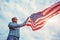 Man holding USA flag. Celebrating Independence Day of America. July 4th