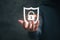 Man holding virtual icon  shield with a lock symbol, concept about security, cybersecurity and protection against dangers