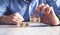 Man holding wooden cubes. Fact or fake. Business concept