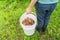 Man holds a compost bucket. Zero waste