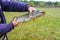 A man holds a river pike in his hands