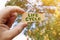 A man holds a sign inside which the inscription - Life Cycle