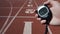 Man holds stopwatch with time ten seconds, world record, victory in competition