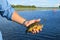 Man Holds Sunfish Caught Fishing a Crankbait Lure