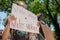 Man holds up sign `white silence = white violence` at a Black Lives Matter protest in Santa Fe