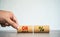 A man holds wooden blocks with the word on and off percentage. Payment or non-payment of interest on loans. Mortgage rates.