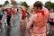 Man Hoses Off Pieces Of Tomatoes After Massive Food Fight