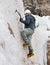 Man with ice axes and crampons