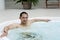 Man in indoor jacuzzi