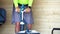 Man inflates standup puddle board. Person pumping on beach close up shot of pump and person hands in focus while