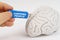 A man inserts a flash drive into his brain with the inscription - chipping people