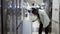 A man inspect the design and quality of fridge before buying in a consumer electronics store