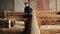 A man inspects beam house on the accuracy of the installation. Wooden house half built