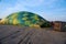 Man inspects the lines of the balloon