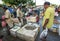 A man inspects a pile of prawns fro sale outside the Negombo Fish Market in Negombo in Sri Lanka.