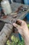 A man inspects the seats of the driveshaft bearings.