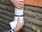 Man installing plastic rain gutter system pipeline. Guttering, Gutters, Plastic Guttering, Guttering & Drainage by Handyman hands.