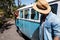 Man interacting with woman in campervan