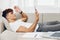 man interior curly freelancer modern selfies phone talking using young sofa person