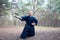 Man with a Japanese sword, a katana practicing Iaido