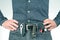 Man in jeans on a leather belt with a flashlight and a knife. survival items