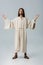 Man in jesus robe standing with outstretched hands on grey