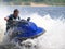 Man on jet-ski turns very fast