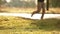 A man jogs early in the morning after a brief rain